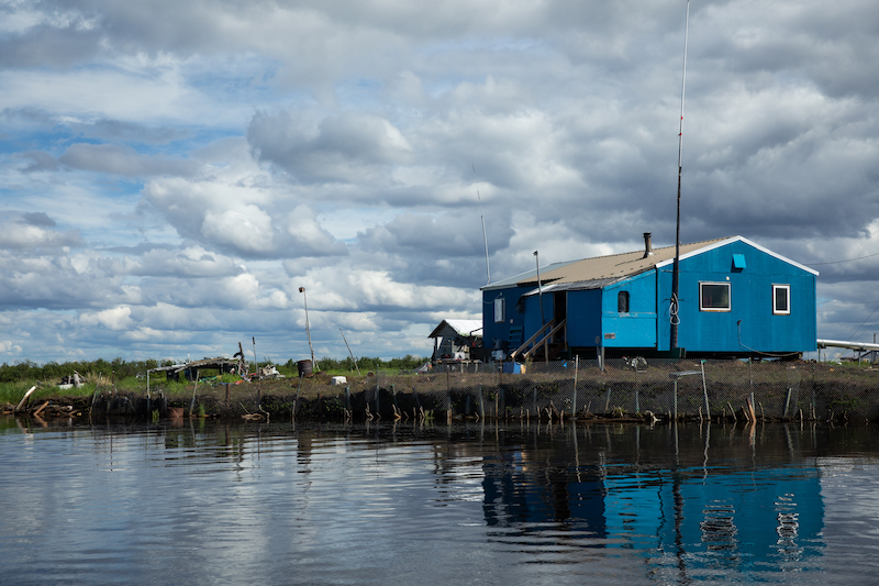 A home near a continually eroding section of the Selawik River.